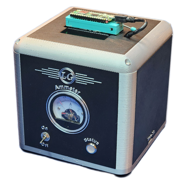 MicroMETER base unit with a Pico seated in its plynth fixture on top — brushed aluminum and black chassis with analog ammeter, power switch, and status light